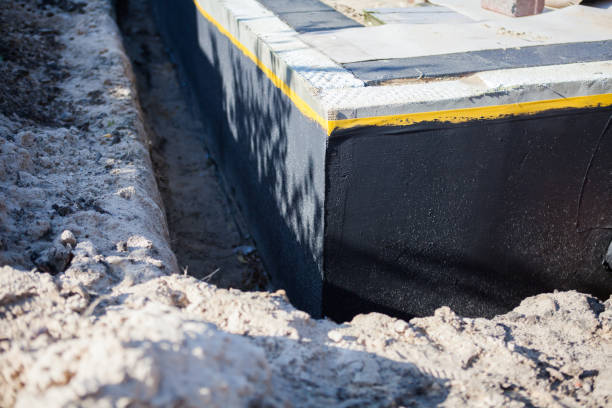 Professional Emergency Waterproofing technician working in Port Jefferson, OH